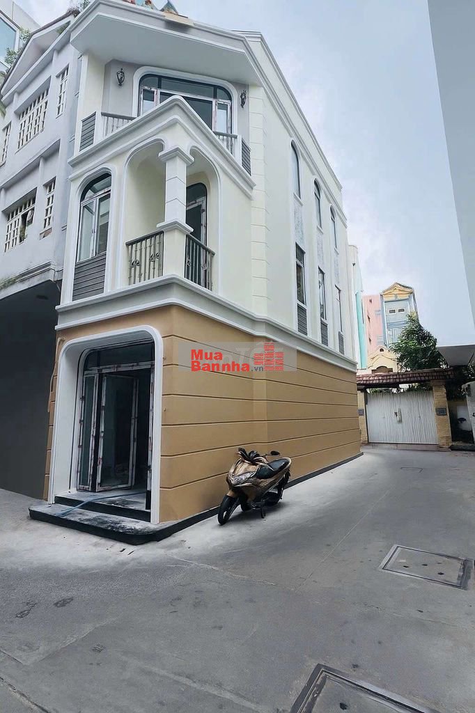 BÁN NHÀ ĐẸP MỚI XÂY ĐƯỜNG XE HƠI QUẬN 4.