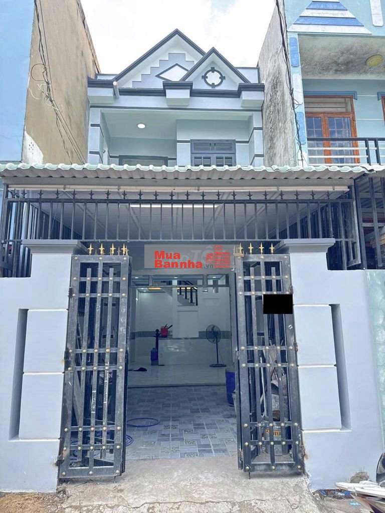 Bán nhà trệt lầu đẹp đường xe hơi gần ngã tư Chiêu Liêu, Dĩ An