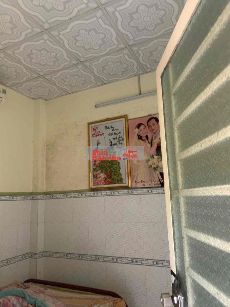 nhà lầu + dư đất vườn kế bên trồng cây