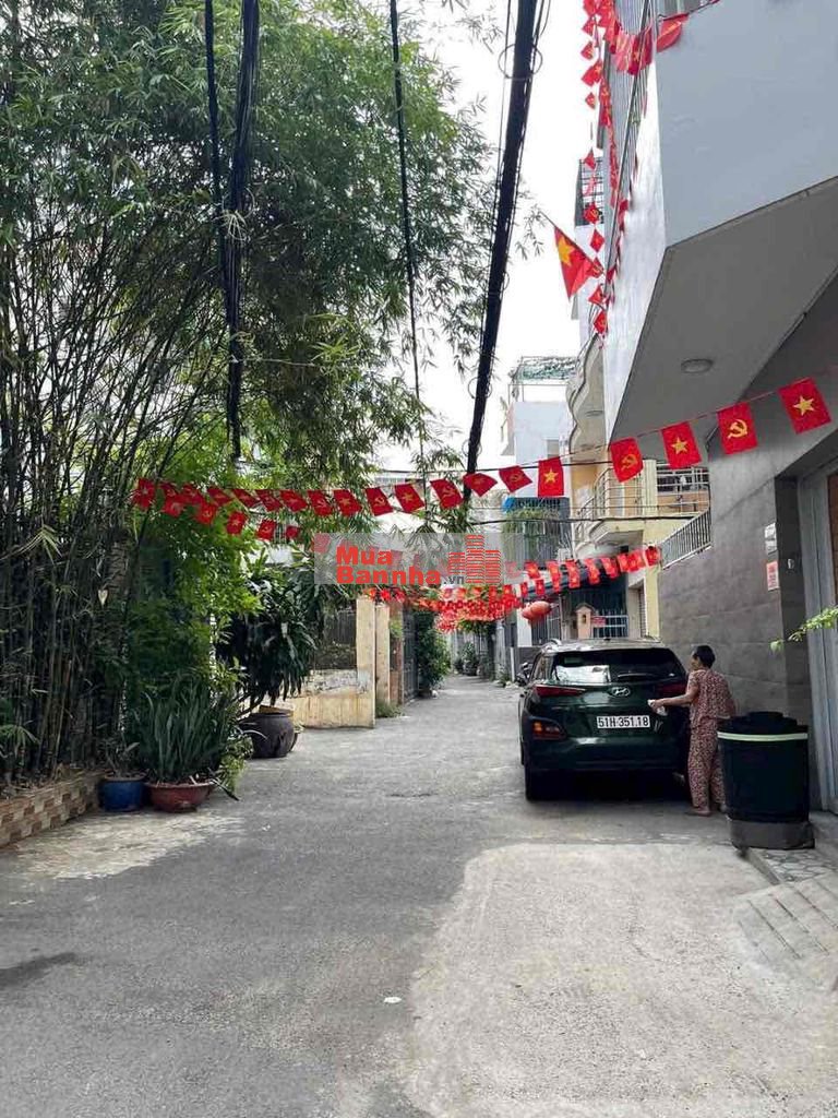 Nhà 2 mặt hẻm - xe hơi - 2 lầu 4 phòng Gần sân bay