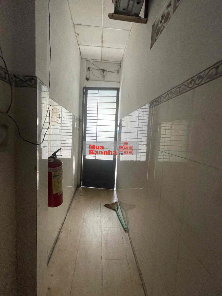 Bán nhà mặt tiền đường Khu Chợ Bà Hom - 4x22m. 1 tr 2Lầu. 13 phòng