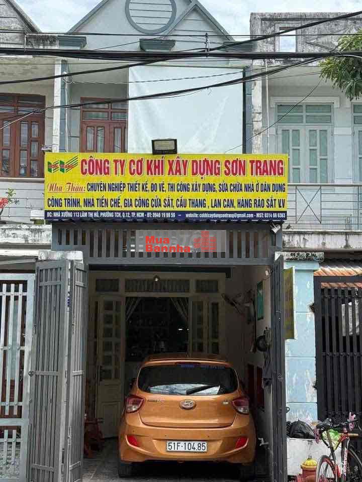 Cần bán nhà mặt tiền đường lớn xe hơi đậu thoải mái