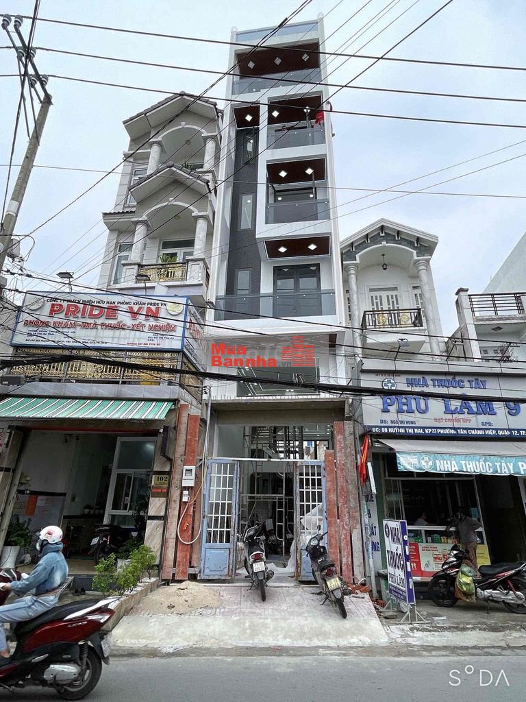 Bán Tòa nhà 6 tầng có Thang Máy 650kg.Mặt tiền Đường Huỳnh Thị Hai.Q12