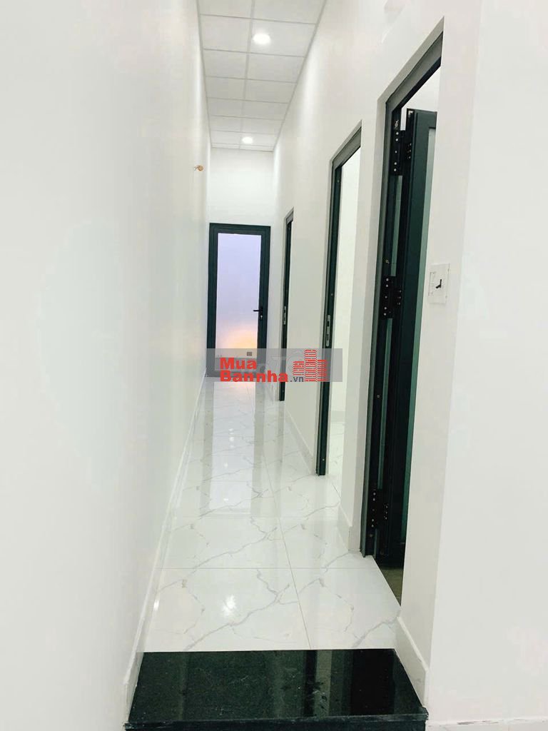 Bán nhà mới 4.25*14m. Hẻm xe hơi ngắn Tân Xuân. Hocmon