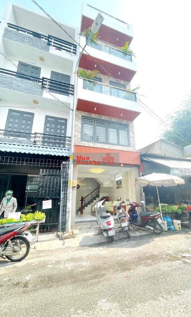 NHÀ MẶT TIỀN 4 LẦU KINH DOANH NẰM NGAY CHỢ GIÁ *** KV