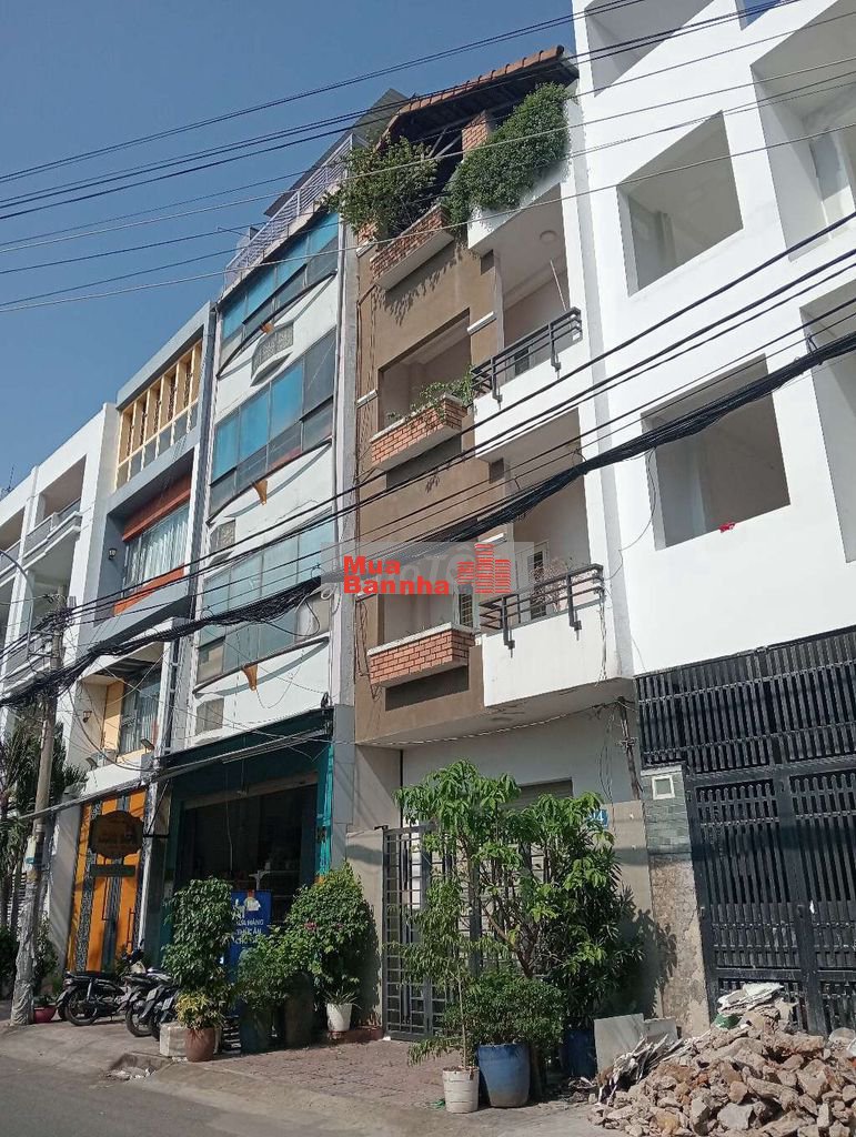 Nhà 4 tầng mặt tiền kdc cao lỗ p4 q8 DT 5m x 15m trệt 3 lầu