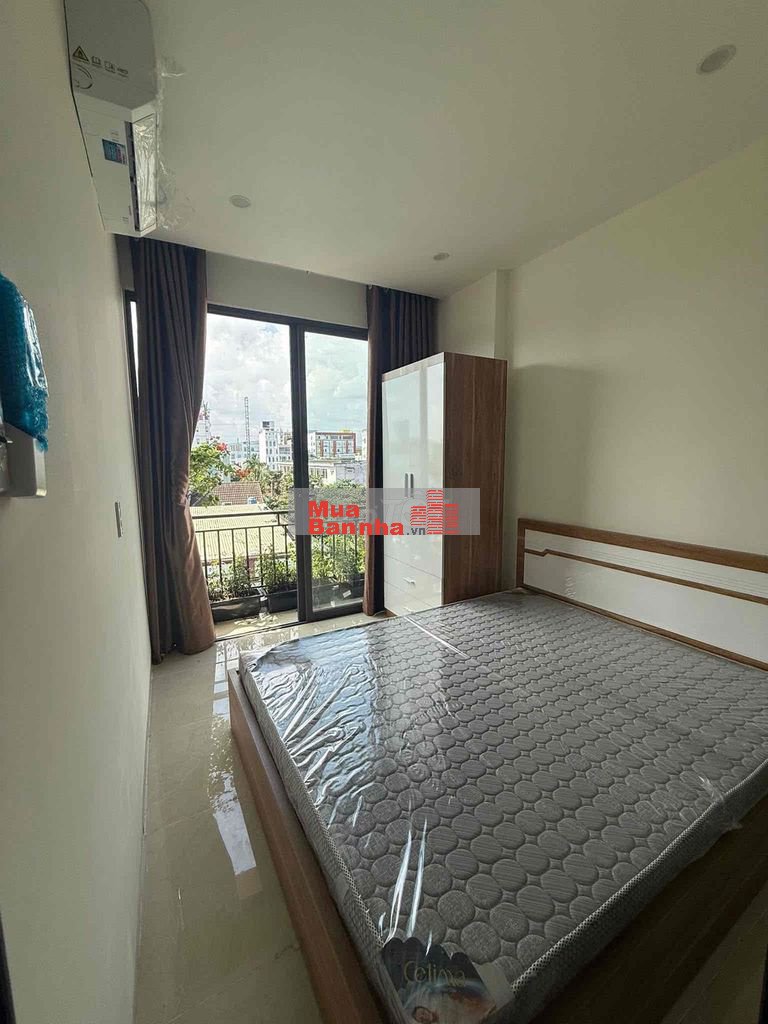 bán toà căn hộ 4.5 tầng mặt tiền 5m5 gần phan đăng lưu