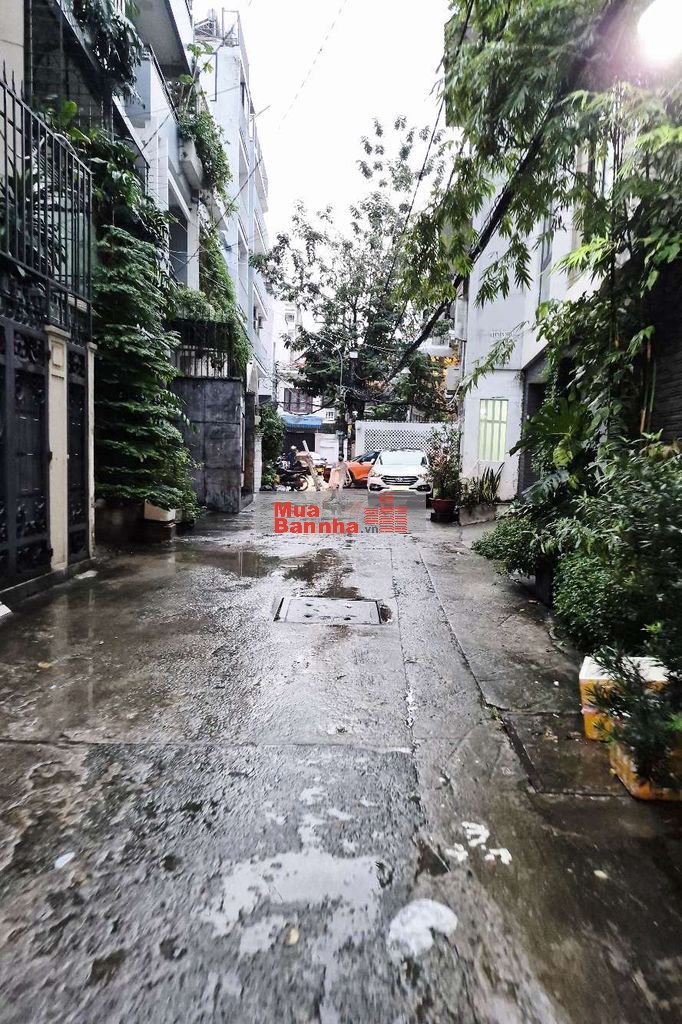 Nguyễn Củu Vân nhà DT 75m, sát hẻm xe hơi, xây CHDV 4 tầng, nhỉnh 7t