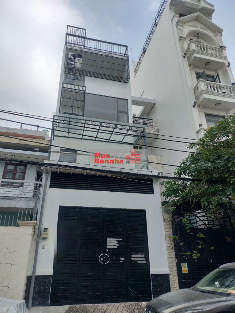 Bán nhà Mặt Tiền đường số DT:4,5x13 nhà 5Tầng phường tân quy quận 7