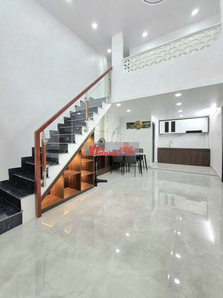 nhà 7x10m 1 lửng 3pn kế hẻm xe hơi Huỳnh Tấn Phát