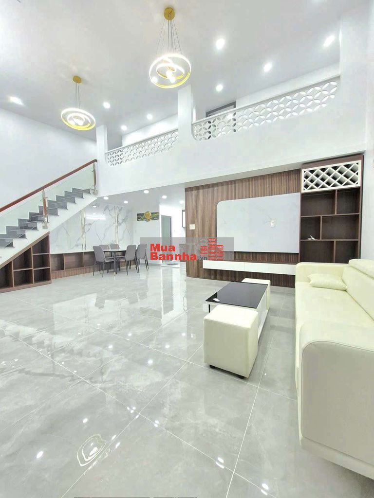 nhà 7x10m 1 lửng 3pn kế hẻm xe hơi Huỳnh Tấn Phát