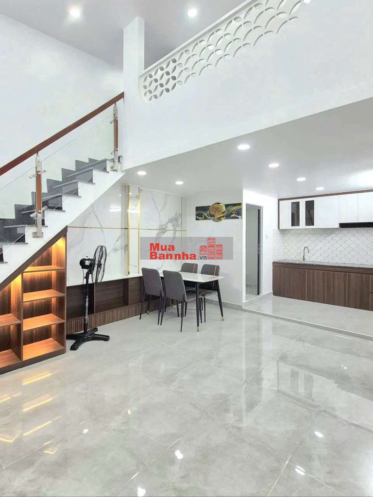 nhà 7x10m 1 lửng 3pn kế hẻm xe hơi Huỳnh Tấn Phát