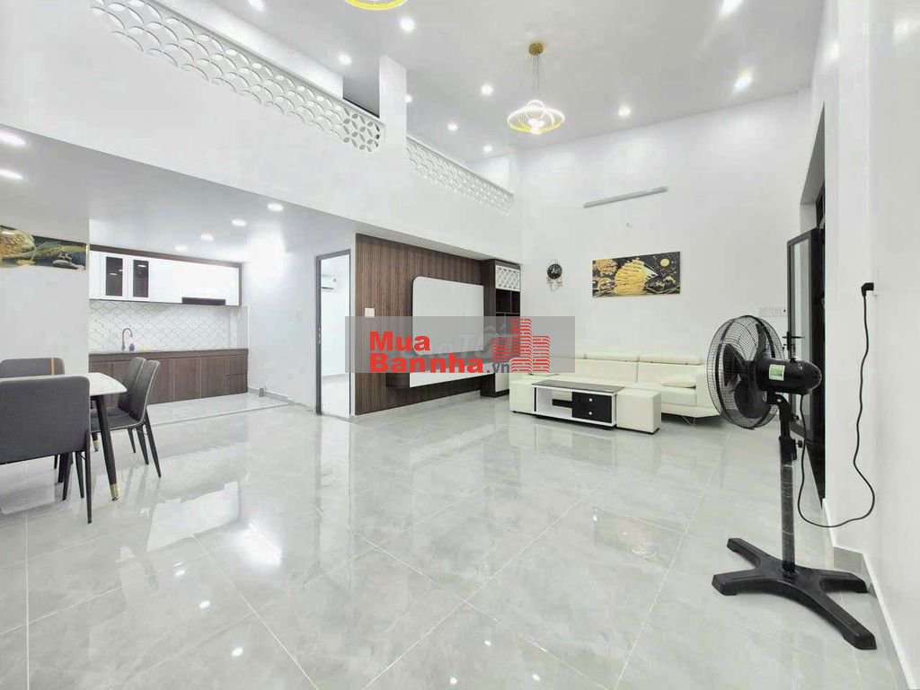 nhà 7x10m 1 lửng 3pn kế hẻm xe hơi Huỳnh Tấn Phát