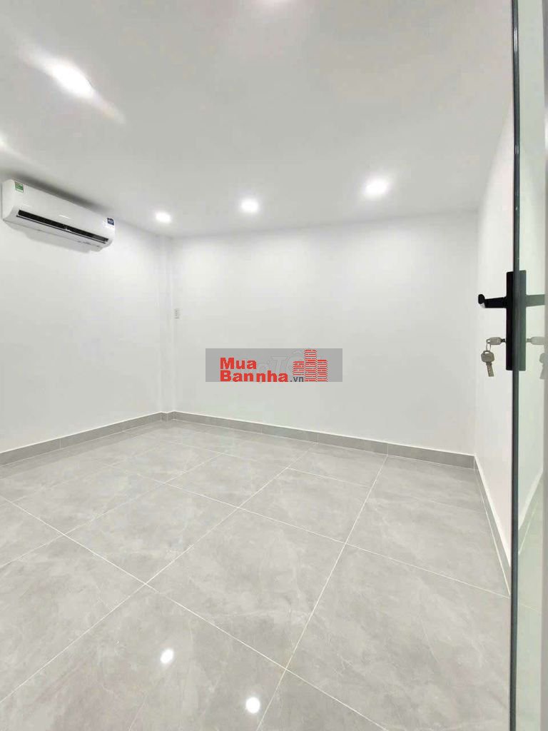 nhà 7x10m 1 lửng 3pn kế hẻm xe hơi Huỳnh Tấn Phát