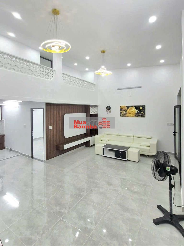 nhà 7x10m 1 lửng 3pn kế hẻm xe hơi Huỳnh Tấn Phát
