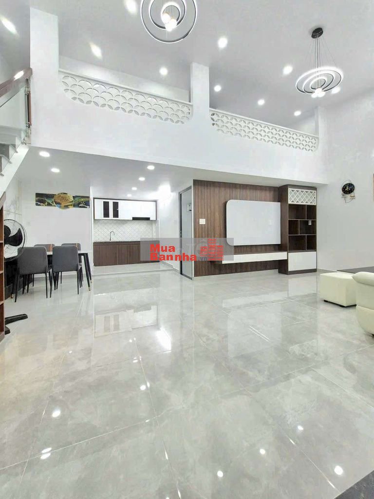 nhà 7x10m 1 lửng 3pn kế hẻm xe hơi Huỳnh Tấn Phát