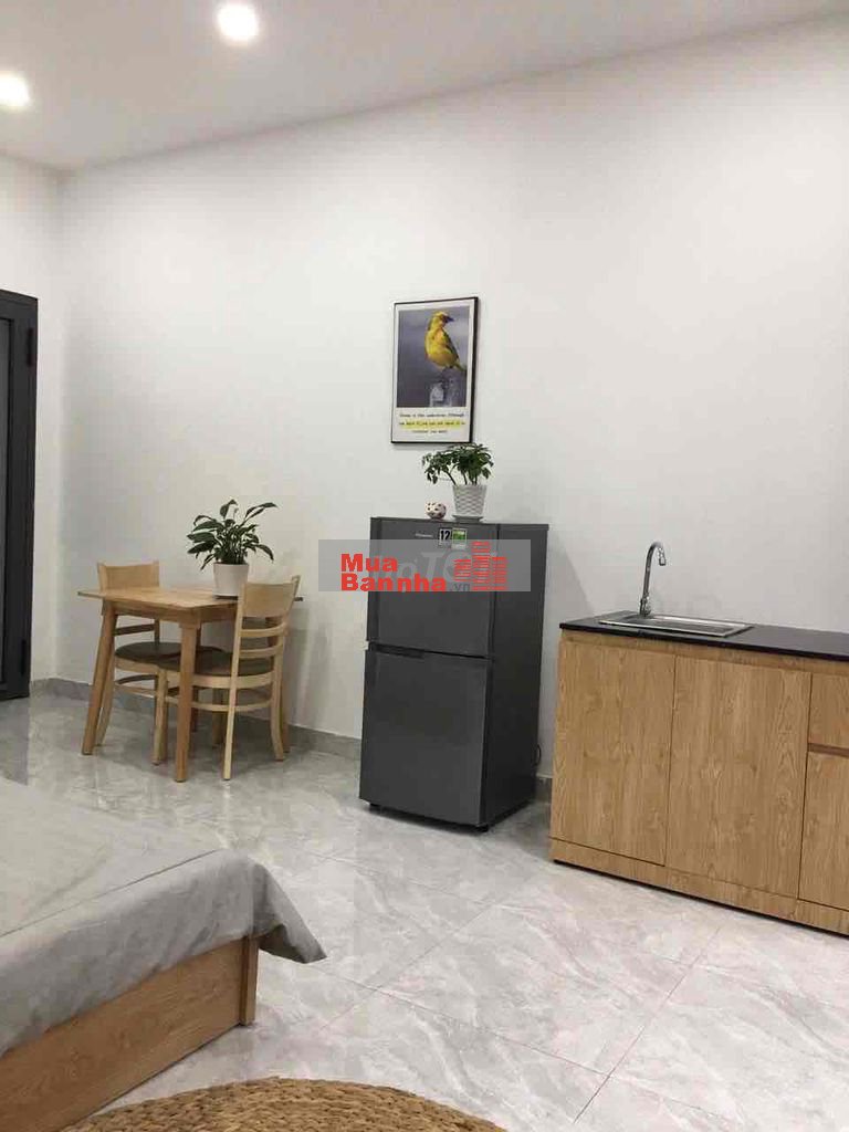 Toà nhà Huỳnh Văn Bánh thu nhập 120tr/t 6 x 23m hầm 6 lầu ST 23 phòng