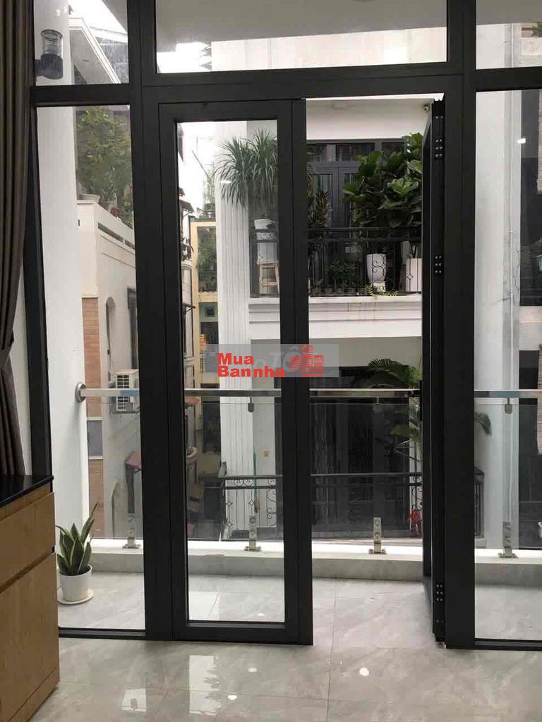 Toà nhà Huỳnh Văn Bánh thu nhập 120tr/t 6 x 23m hầm 6 lầu ST 23 phòng