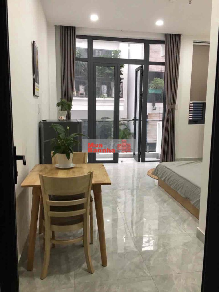Toà nhà Huỳnh Văn Bánh thu nhập 120tr/t 6 x 23m hầm 6 lầu ST 23 phòng