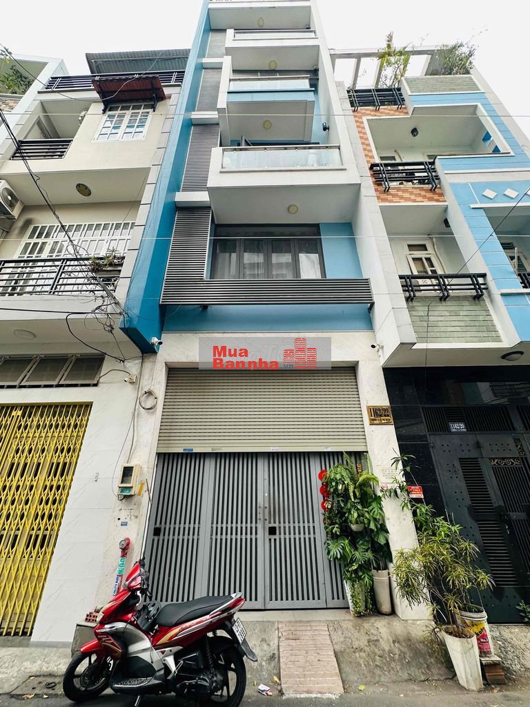 Toà nhà Huỳnh Văn Bánh thu nhập 120tr/t 6 x 23m hầm 6 lầu ST 23 phòng
