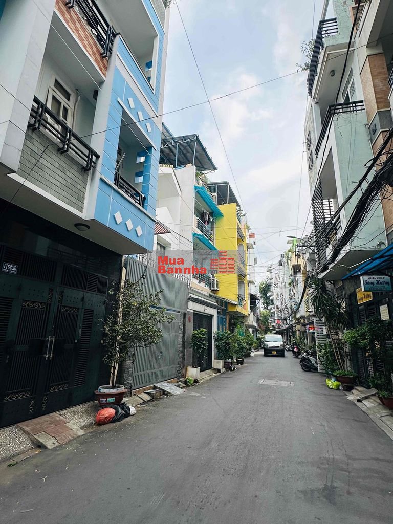 Toà nhà Huỳnh Văn Bánh thu nhập 120tr/t 6 x 23m hầm 6 lầu ST 23 phòng