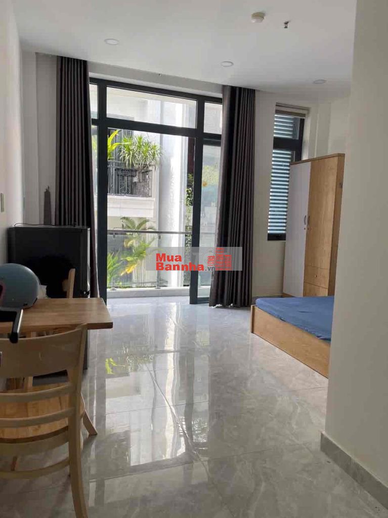 Toà nhà Huỳnh Văn Bánh thu nhập 120tr/t 6 x 23m hầm 6 lầu ST 23 phòng