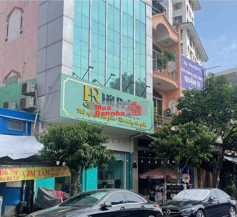 Bán nhà 338 Lạc Long Quân gần vòng xoay Đầm Sen. DT: 7 x 8m, 4 tầng.