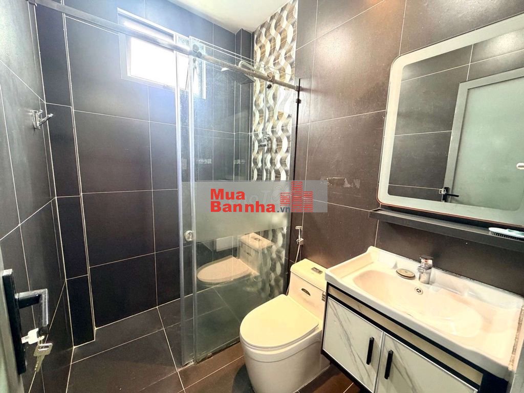 nhà bán bùi đình túy 4 tầng sổ hồng riêng, gần chợ bà chiểu 70m2