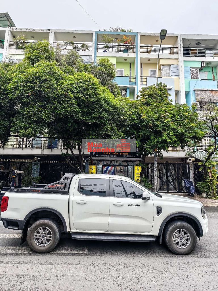 Mặt tiền đường 23 KDC Bình Phú 4.5x20 1 trệt 4 lầu