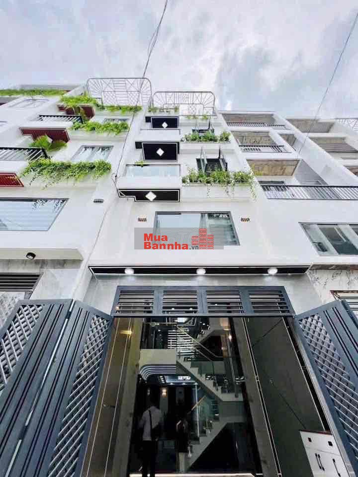 Nhà 4.11m x 13.08m xây 4.5 tầng full nội thất hẻm 8m thông KDC đồng bộ