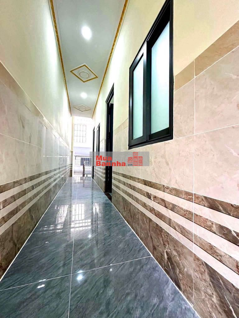 Nhà phố kdc hẻm Phan Bội Châu gần trường cấp 1.2 Dĩ An p. Dĩ An