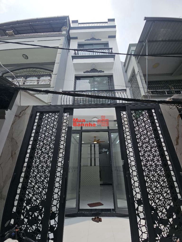 Nhà xây mới 4 tầng sát bên hẻm xe hơi