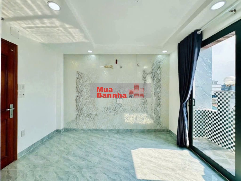 Nhà thang máy 4x15 1 lửng 3 lầu Quang Trung ngay kenh tham lương