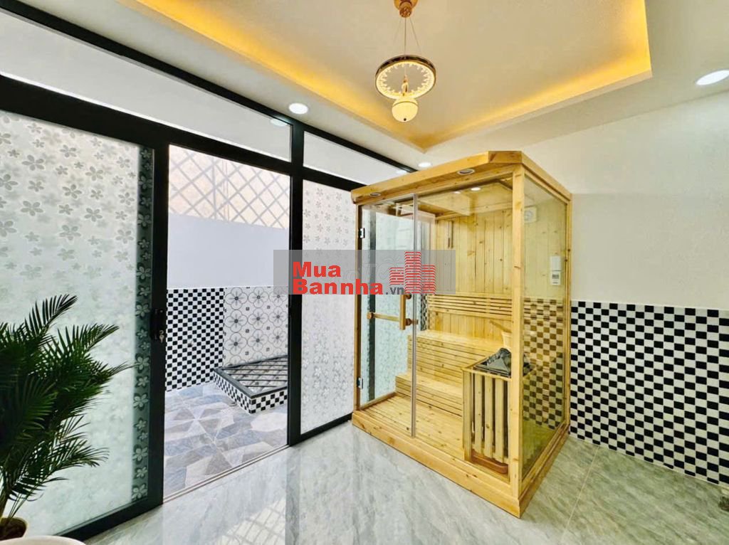 Nhà thang máy 4x15 1 lửng 3 lầu Quang Trung ngay kenh tham lương