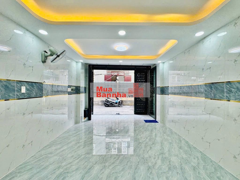 Nhà thang máy 4x15 1 lửng 3 lầu Quang Trung ngay kenh tham lương