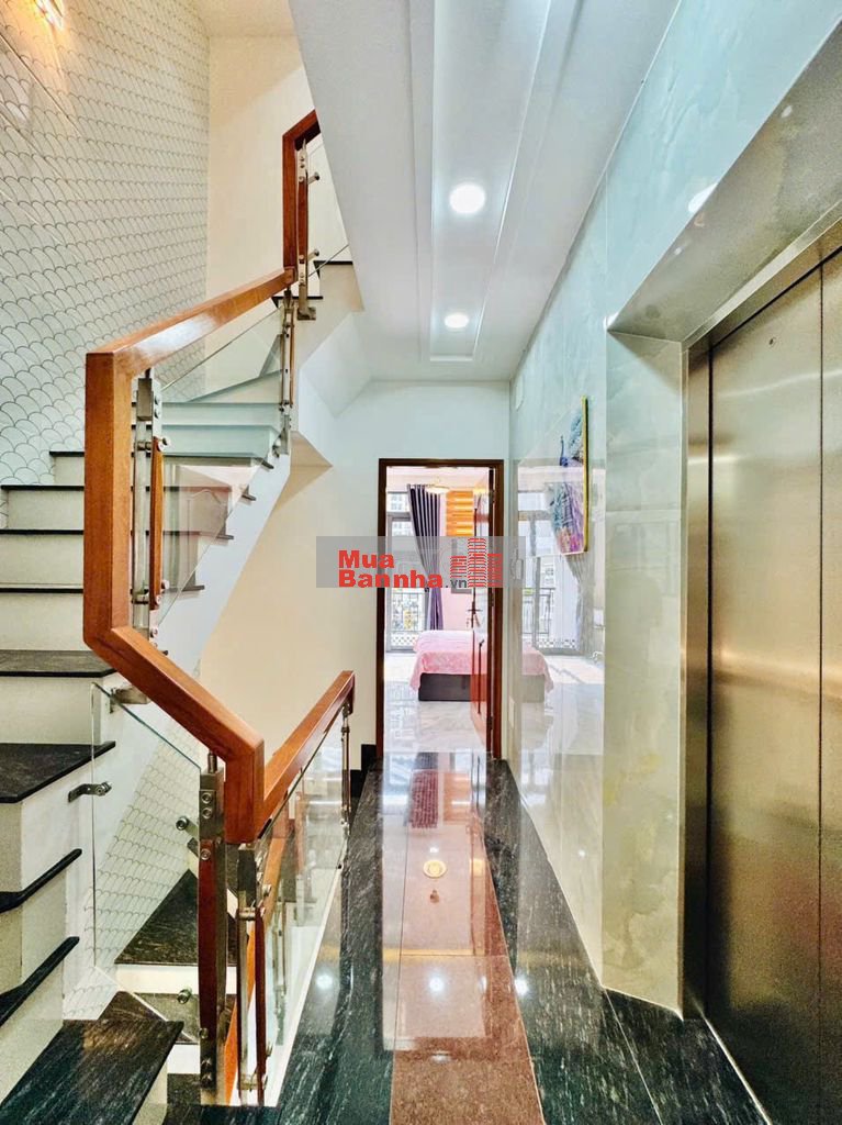 Nhà thang máy 4x15 1 lửng 3 lầu Quang Trung ngay kenh tham lương