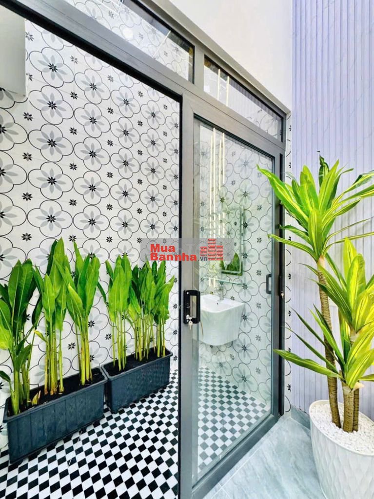 Nhà thang máy 4x15 1 lửng 3 lầu Quang Trung ngay kenh tham lương